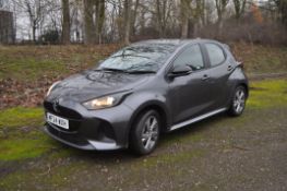 A 2024 MAZDA 2 HYBRID EXCLUSIVE-LN CVT FIVE DOOR HATCHBACK CAR in grey with the registration MF24