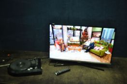 A SAMSUNG UE32J5100 32in TV with remote and a Zennox retro turntable (both PAT pass and working) (