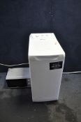 A HOTPOINT WTL500 TOP LOADING WASHING MACHINE width 40cm, depth 60cm, height 90cm (PAT pass, spin
