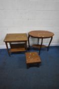 A 20TH CENTURY OVAL TABLE, with a wavy edge, raised on four shaped legs, united by an undershelf,