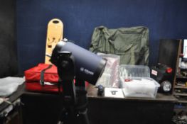 A MEADE INSTRUMENTS LX90 ACF TELESCOPE with tripod, remote, manual, eyepieces, focal reducer,