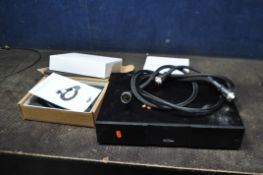 A NAIM AUDIO CD555PS POWER SUPPLY FOR LOT 54 with two interlink cable, manual and boxed power
