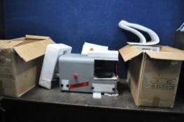 TWO GD MINI 1 POLISHING MACHINES with extractors in boxes (BUYER BEWARE, factory returned stock,