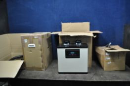 FOUR BOXES CONTAINING TWO FUME EXTRACTORS AND PIPEWORK (BUYER BEWARE, factory returned stock,
