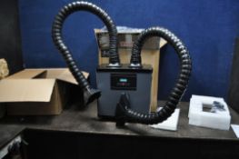 A FUME EXTRACTOR IN BOX AND A BOX OF PIPEWORK (BUYER BEWARE, factory returned stock, could be new