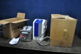 AN ELMASTEAM 4,5 BASIC STEAM CLEANER along with an Elmasonic Xtra TT ultrasonic bath (lid