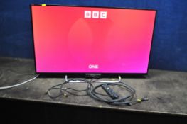 A SONY KDL-42W653A 42in SMART TV with Eartema universal remote, two HDMI and one optical cables (PAT