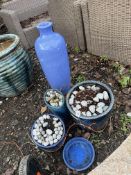 FIVE BLUE GLAZED GARDEN ITEMS including three round plant pots, an urn 70cm high and a platter(5)
