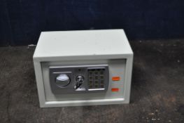 A SMALL ELECTRONIC PERSONAL SAFE with two keys but no cover to key hole (electronically untested)