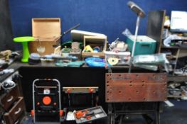 A LARGE QUANTITY OF TOOLS AND GARDENING EQUIPMENT including a Workmate, paint brushes, saw, trowels,