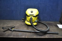 A KARCHER WD2 PLUS VACUUM CLEANER with floor head and pipework (PAT pass and working)