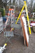 A FOLDING METAL GARDEN TABLE WITH TWO MATCHING CHAIRS , a modern deck chair and an Easylife door