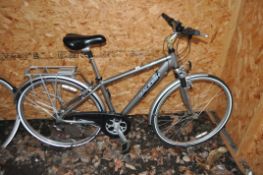 A MODERN RALEIGH PIONEER 180 GENTS MOUNTAIN BIKE with 21 speed twist grip gears, 16in frame and rear