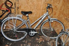 A MODERN RALEIGH PIONEER 180 LADIES MOUNTAIN BIKE with 21 speed twist grip gears, 16in frame and