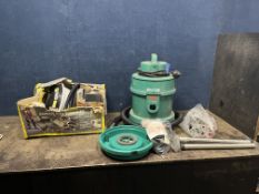 A VAX V1050 CARPET WASHER, with tubes, floor head, pipework, dry filter along with an Earlex Combi