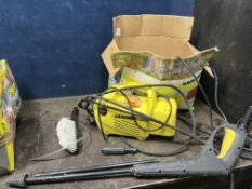 A KARCHER 205 PRESSURE WASHER, with lance and some nozzles (PAT pass and working)