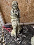 A CONCRETE GARDEN FIGURE IN THE FORM OF A SHEPHERDESS HOLDING A LAMB, 75cm high Condition Report: no