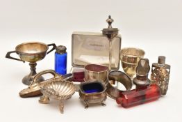 AN ASSORTMENT OF ITEMS, to include a small trophy cup, an egg cup, a salt, two napkin rings, each