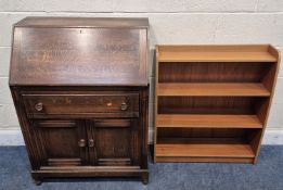 A 20TH CENTURY OAK BUREAU, the fall front door enclosing a fitted interior, over a single drawer and
