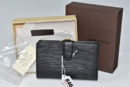 A BOXED LOUIS VUITTON M63242 LADIES BI FOLD WALLET IN BLACK EPI LEATHER, impressed logo to the