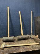 TWO LARGE RUBBER MALLETS, a pick axe and a sledge hammer (4)