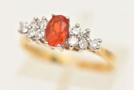 AN 18CT GOLD FIRE OPAL AND DIAMOND CLUSTER RING, hallmarked 18ct Birmingham, ring size M,