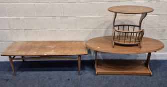 A MID CENTURY TEAK RECTANGULAR COFFEE TABLE, raised on cylindrical tapered legs, width 131cm x depth