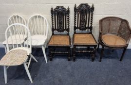 A 20TH CENTURY FRENCH BERGERE ARMCHAIR, raised on cylindrical tapered legs, a pair of oak chairs,