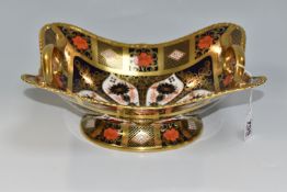 A ROYAL CROWN DERBY TWIN HANDLED BASKET, in Old Imari 1128 pattern with solid gold band, of