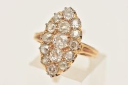 AN EARLY 20TH CENTURY YELLOW METAL DIAMOND CLUSTER RING, navette shape set with a cluster of old cut
