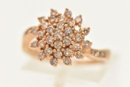 A 9CT YELLOW GOLD BROWN DIAMOND CLUSTER RING, thirty seven round brilliant cut diamonds,