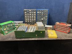 A TRAY AND TWO TOOL CADDIES CONTAINING ELECTRONIC PARTS, including resistors, capacitors,