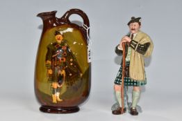 TWO PIECES OF ROYAL DOULTON CERAMICS, comprising a Doulton Kingsware ceramic Dewars Whisky jug/