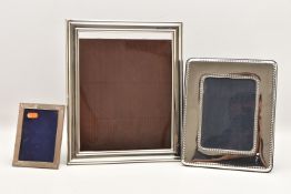 THREE ITALIAN SILVER AND WHITE METAL FRONTED PICTURE FRAMES, one measures approximately 360mm x