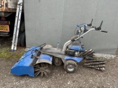 A HYUNDAI HYSW1000 PETROL POWER SWEEPER with collection box and a pair of spare brushes, Condition
