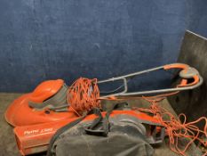 A FLYMO 1500 GARDEN VAC (PAT pass and working) and a Flymo Turbo Lite 400 lawn mower (taped cable,