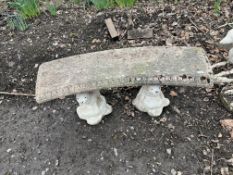 A CURVED CONCRETE GARDEN BENCH with squirrel supports width 110cm Condition Report; no obvious