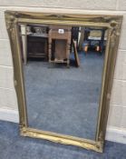 A GILT WOOD RECTANGULAR BEVELLED EDGE WALL MIRROR, 197cm x 75cm, along with a black metal framed