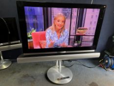 A BANG & OLUFSEN BEOVISION 7-55 TV with a 55in screen, soundbar, motorised stand, manual and