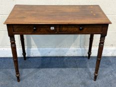 A VICTORIAN MAHOGANY SIDE TABLE, with two drawers, on turned legs, width 99cm x depth 51cm x