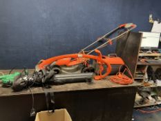 A FLYMO ROLLEMO LAWN MOWER with grassbox, a Flymo Revolution 2500 strimmer and a Gardenline blower/