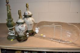 A GLASS FISH PLATE AND THREE LAMP BASES comprising a Pukeberg-style glass fish plate length 50cm,