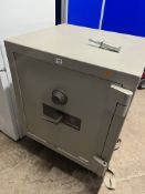 A LARGE CHUBB FIRE SAFE with a combination lock and written combination, width 67cm, depth 64cm,