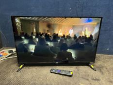 A JVC ROKU 32in TV WITH REMOTE (PAT pass and working)