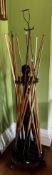 A VICTORIAN STYLE MAHOGANY BILLIARD CUE STAND, raised on tripod paw feet, approximately