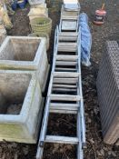 A CLIMA ALUMINIUM DOUBLE EXTENSION LADDER with 14 rungs to each 390cm section, three step ladders