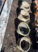 FOUR CONCRETE GARDEN PLANTERS, including a pair of octagonal pots with foliate panels, 38cm across