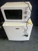 A HAUER TABLE TOP FREEZER, width 50cm, depth 50cm, height 51cm and a George Home microwave (both PAT