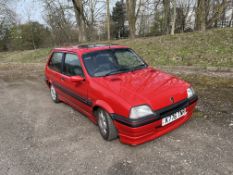 A 1993 ROVER METRO GTi 16V THREE DOOR HATCHBACK CAR in red with a 1396cc petrol engine, five-speed