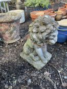 A WEATHERED CONCRETE FIGURE DEPICTING A SEATED LION on a square pad base, 44cm high